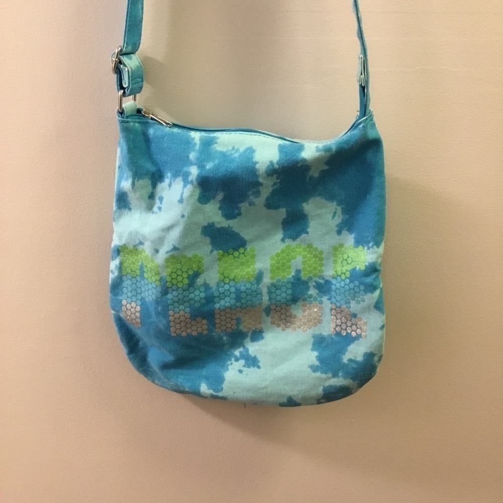 Justice girls and tween cross body bag tie dye wit PEACE lettering in do…